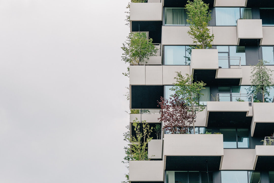 Het groene gebouw 'de Trudo Toren' in Eindhoven is in oktober 2021 opgeleverd. Foto: Canva